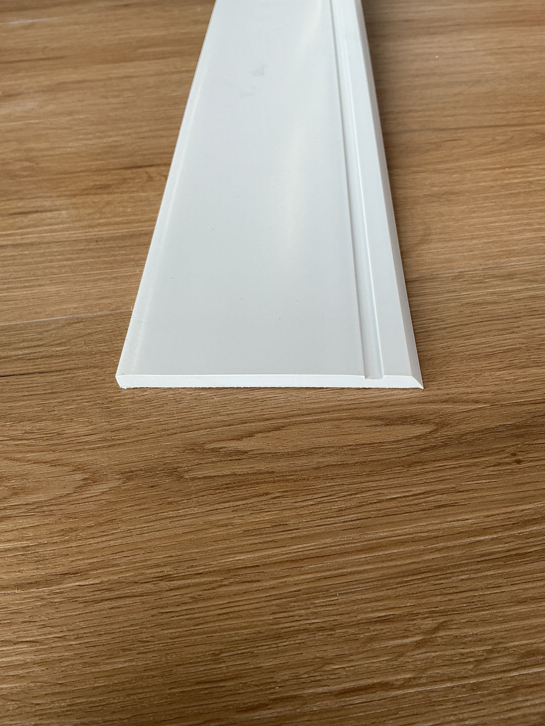 Tarkett / Johnsonite Millwork Reveal 4-1/4" 08 Icicle 4.25" x 8' by 1/4" (64 LF/box)