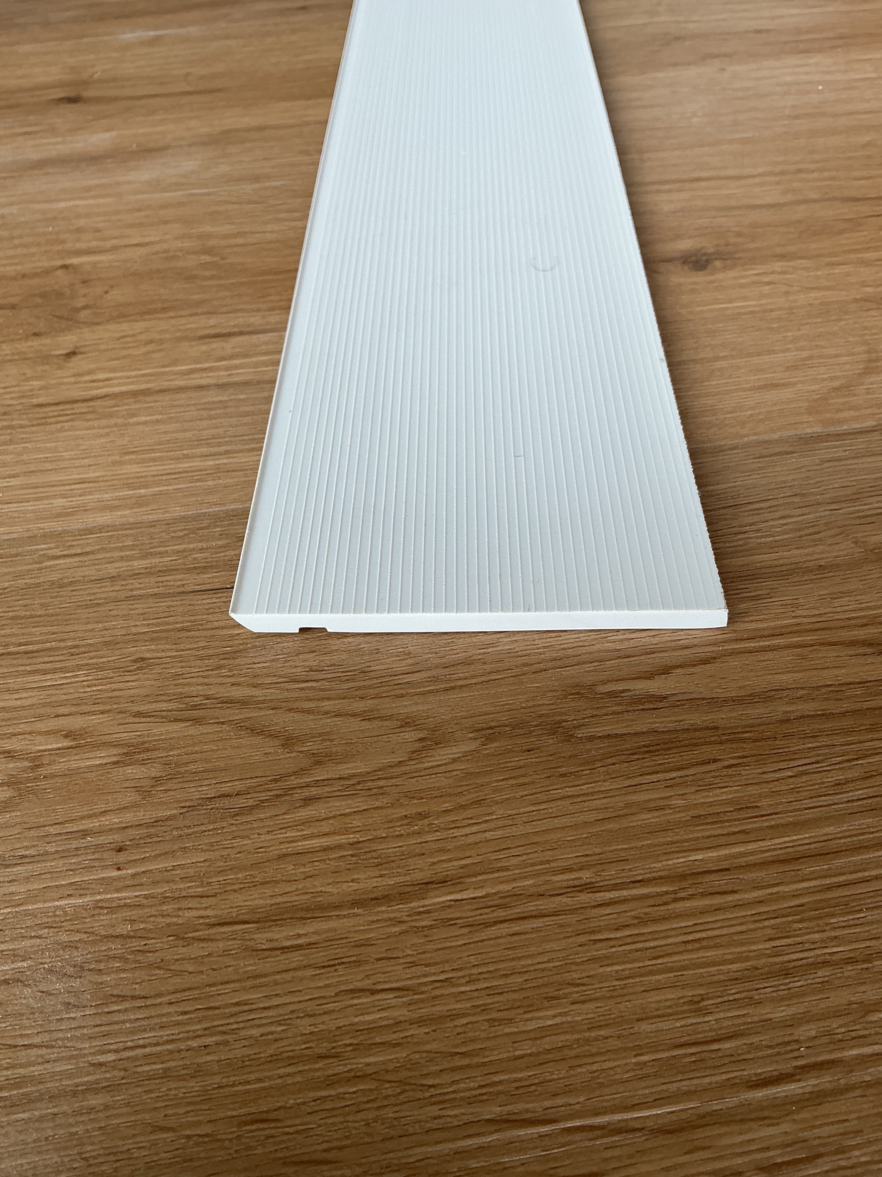 Tarkett / Johnsonite Millwork Reveal 4-1/4" 08 Icicle 4.25" x 8' by 1/4" (64 LF/box)