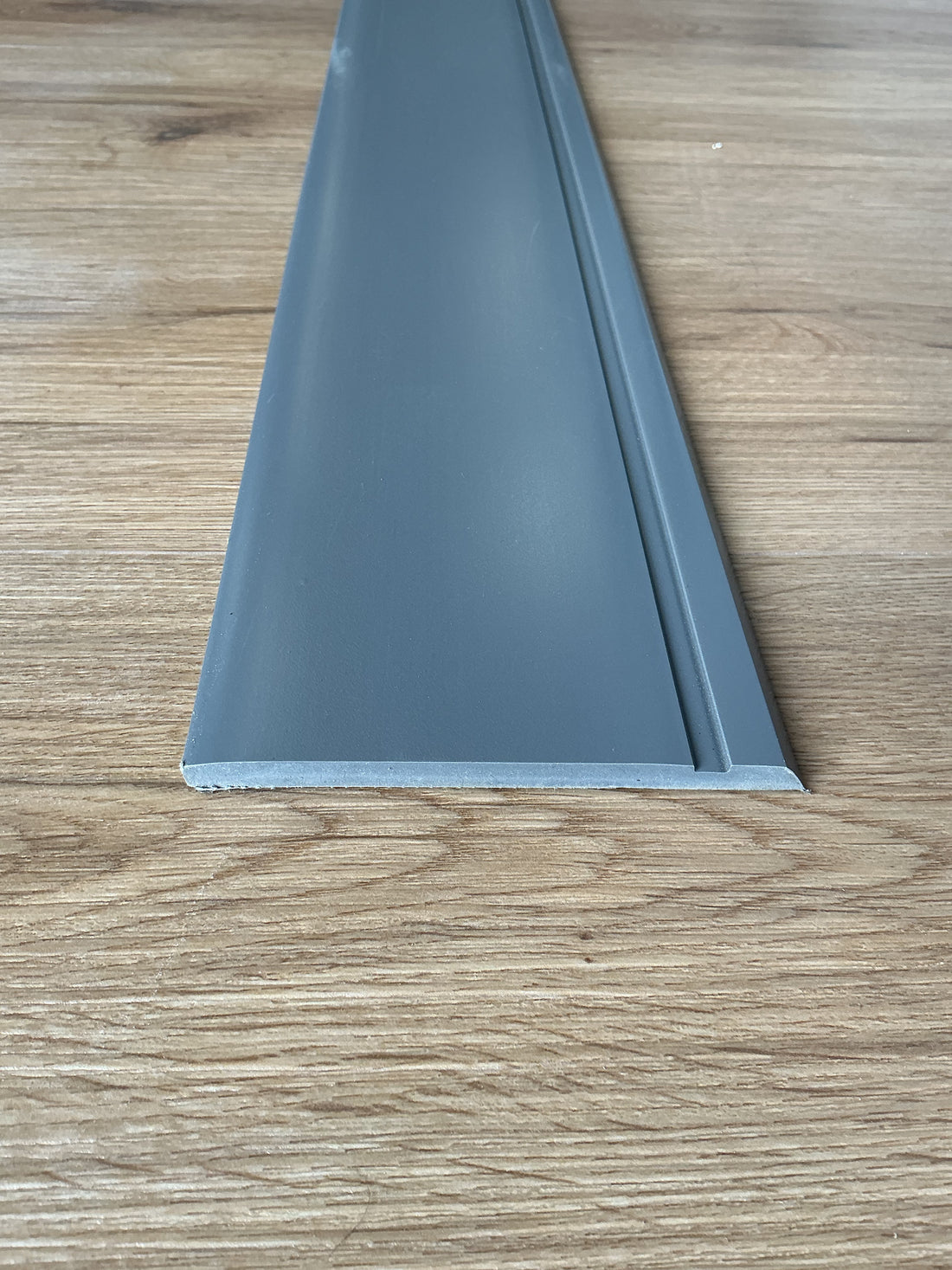 Tarkett / Johnsonite Millwork Reveal 4-1/4" 48 Grey 4.25" x 8' by 1/4" (64 LF/box)